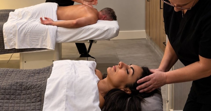 Couples massage in progress at Five Elements Medical Spa in Deerfield Beach