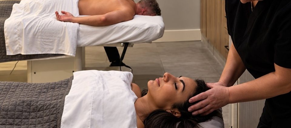 Couples massage in progress at Five Elements Medical Spa in Deerfield Beach